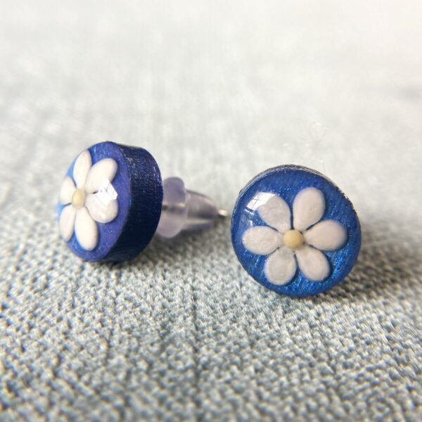 sesame seeds and mustard seed earrings on blue