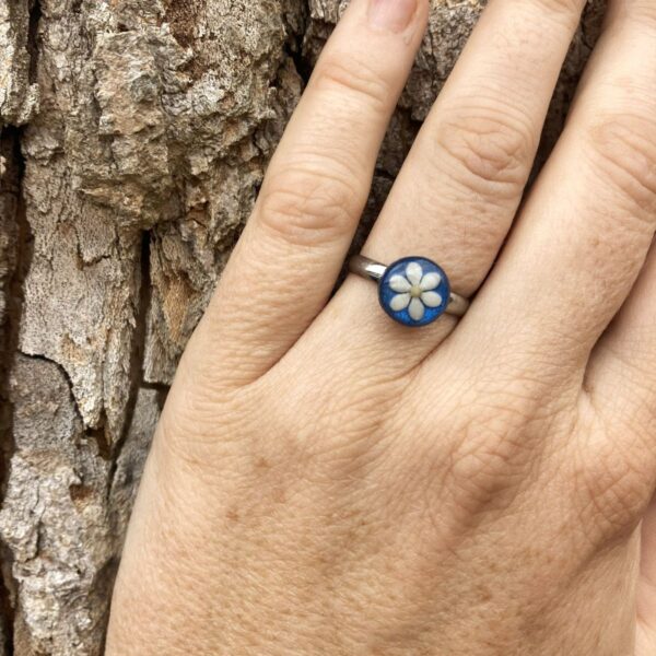 sesame seeds and mustard seed earrings on blue