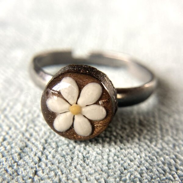 sesame seeds and mustard seed earrings on brown