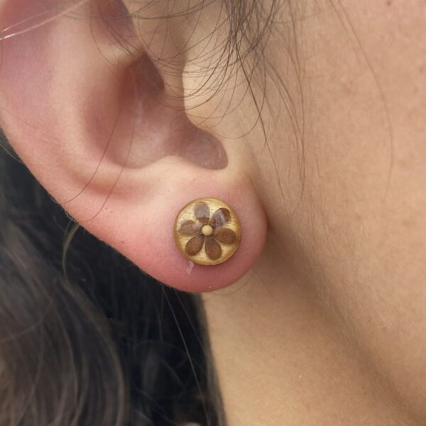 brown sesame seeds and mustard seed earrings on wood