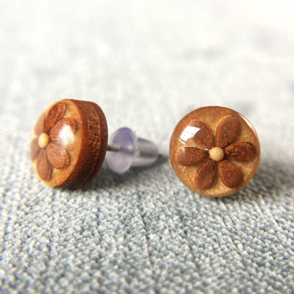 brown sesame seeds and mustard seed earrings on wood