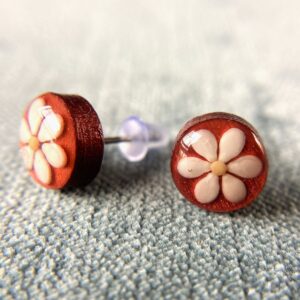 sesame seeds and mustard seed earrings on red
