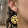 yellow corn earrings model yellow corn and split pea earrings